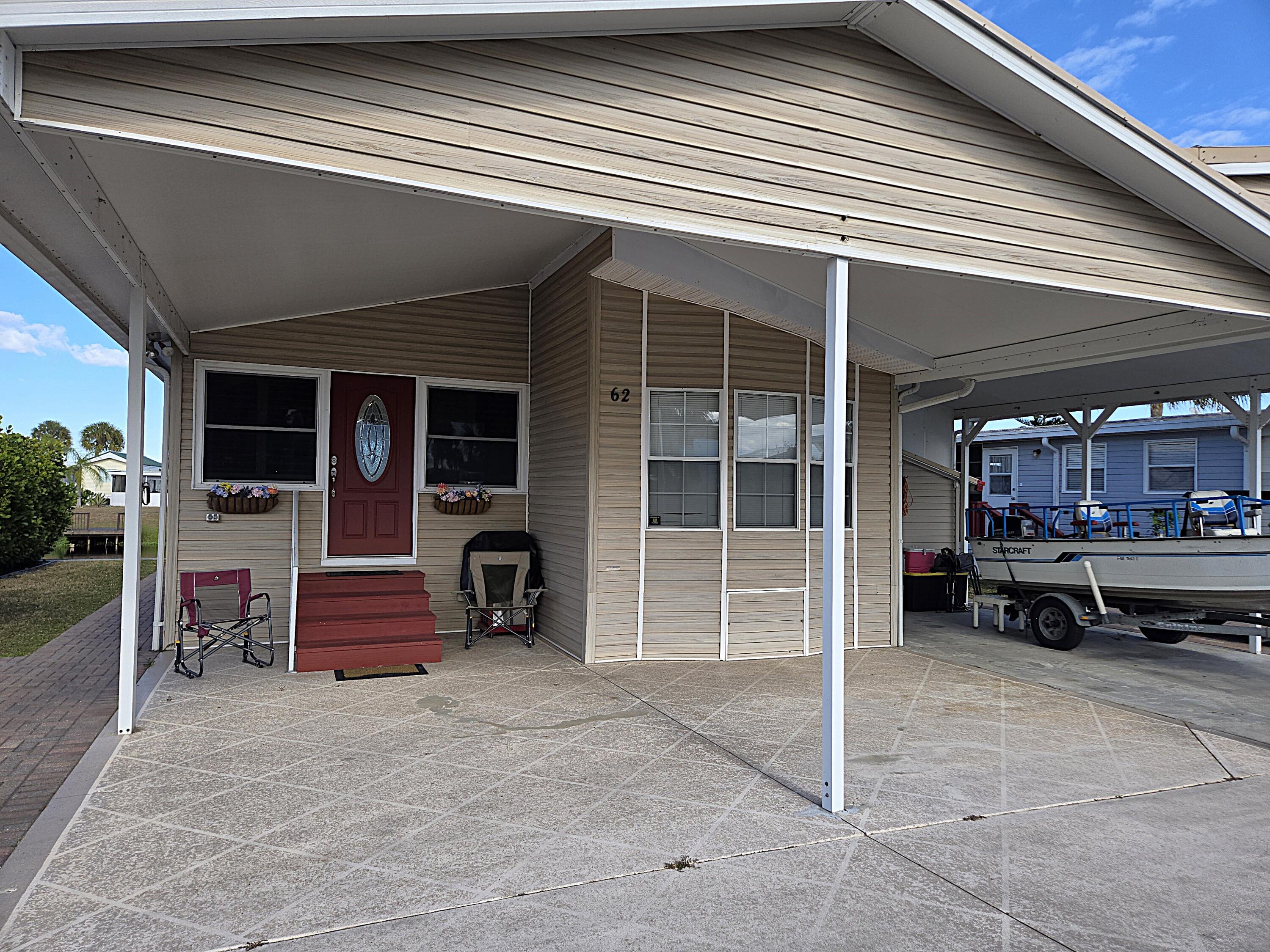 Foto de propiedad en 14041 SE 126th Boulevard 62, Okeechobee, FL 34974 Okeechobee con MLS# 