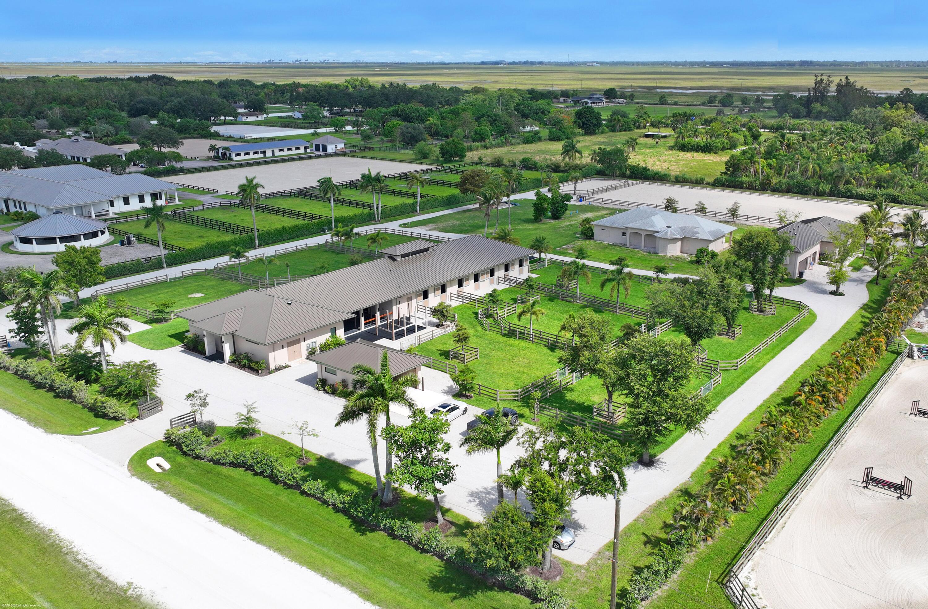 Foto de propiedad en 16219 Hollow Tree Lane, Wellington, FL 33470 Wellington con MLS# 