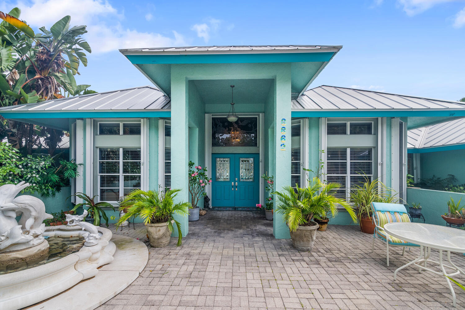 Foto de propiedad en 8862 Estate Drive, West Palm Beach, FL 33411 West Palm Beach con MLS# 