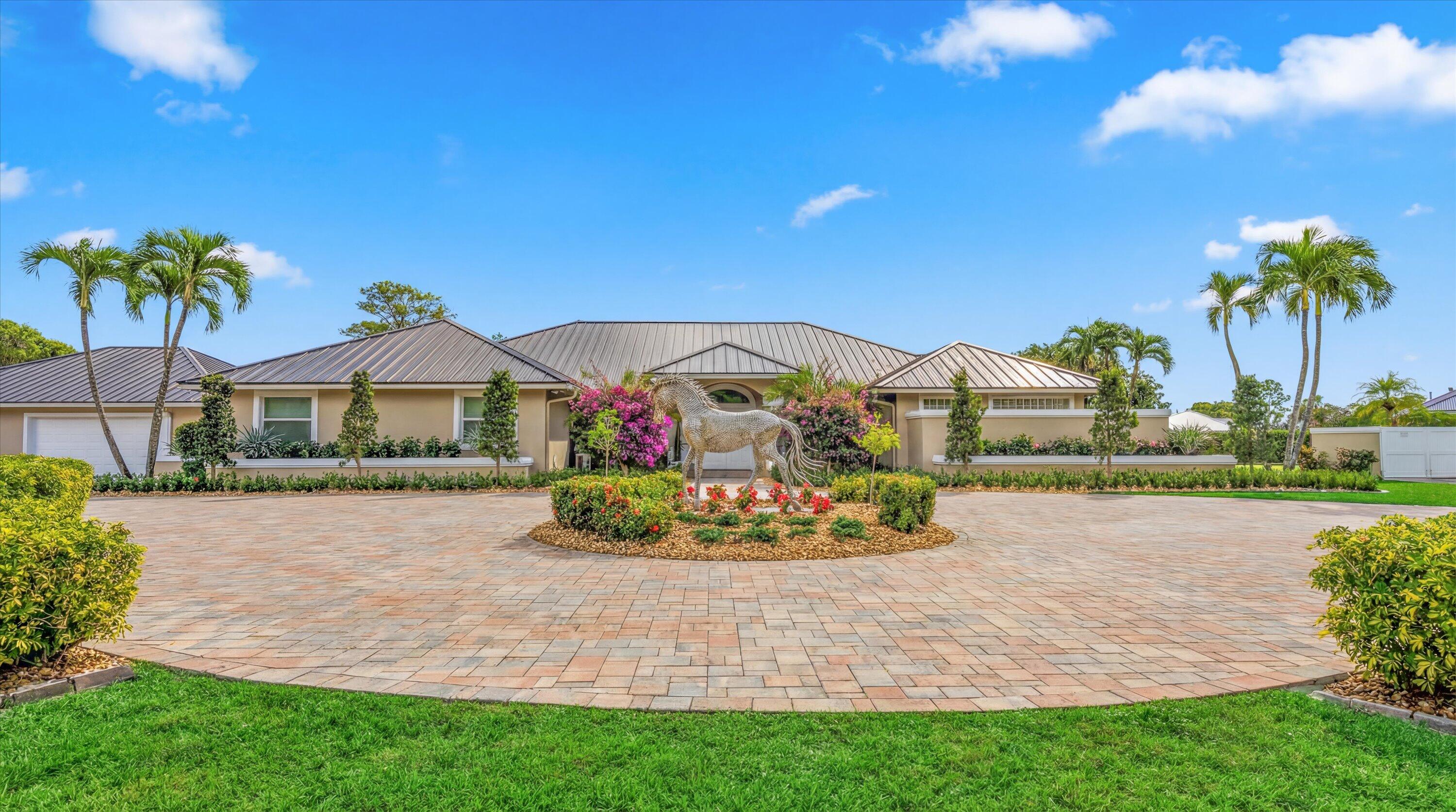 Foto de propiedad en 14868 Paddock Drive, Wellington, FL 33414 Wellington con MLS# 