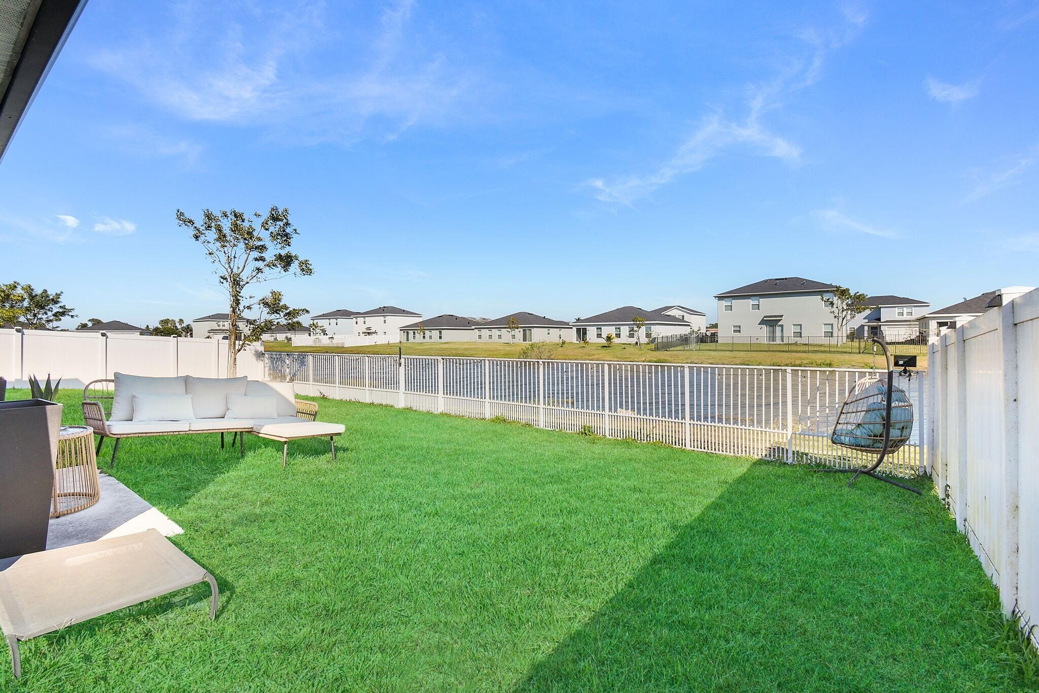 Foto de propiedad en 113 Dabou Loop, Belle Glade, FL 33430 Belle Glade con MLS# 