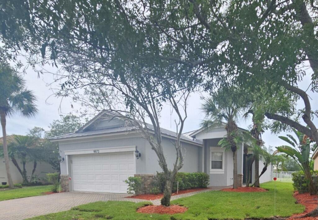 Foto de propiedad en 9872 SW Glenbrook Drive, Port St. Lucie, FL 34987 Port St. Lucie con MLS# 