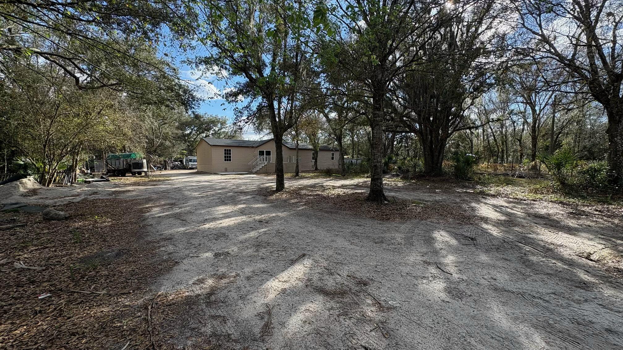 Foto de propiedad en 20480 NW 294th Street, Okeechobee, FL 34972 Okeechobee con MLS# 