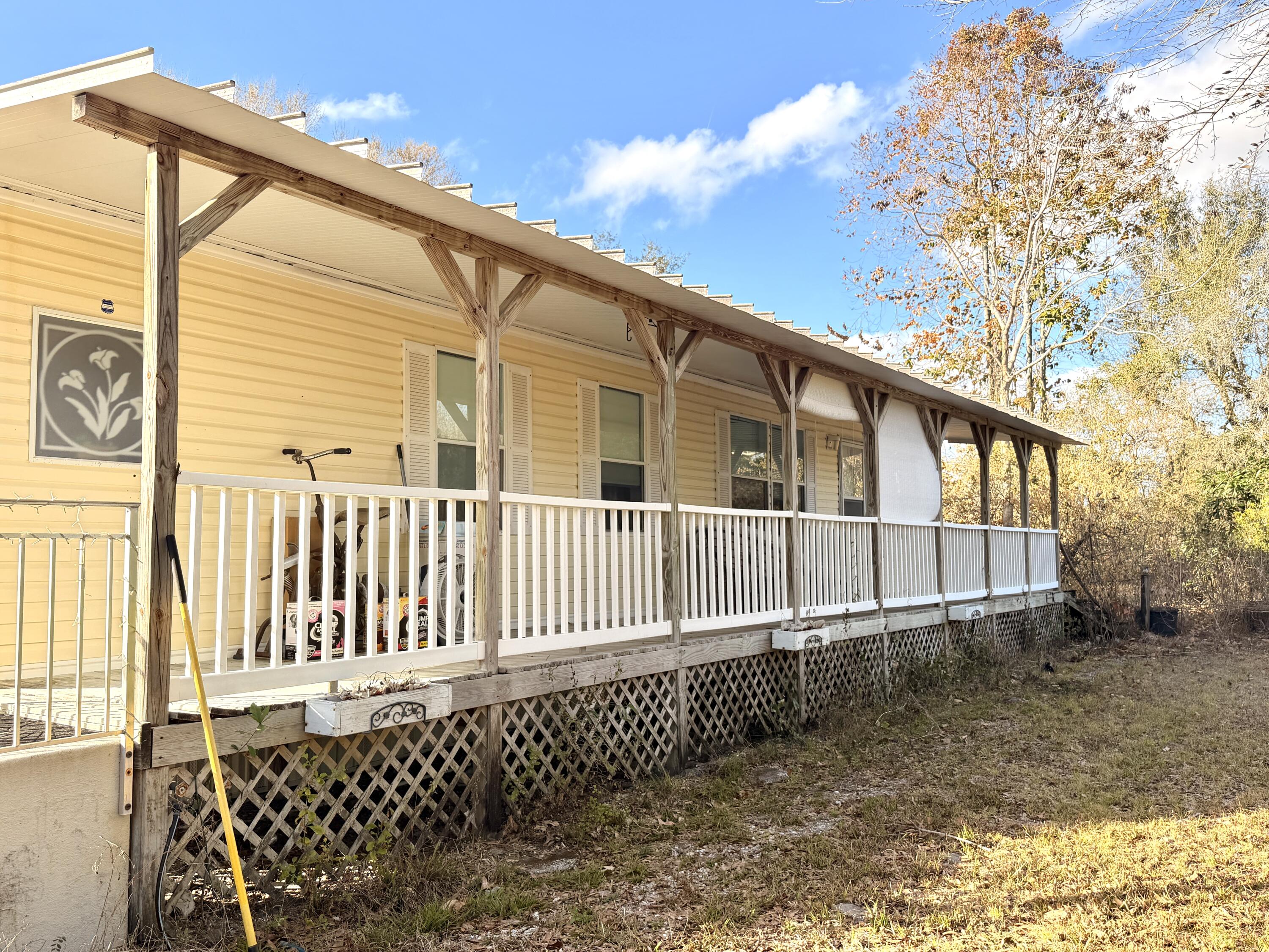 Foto de propiedad en 1907 NE 308th Street, Okeechobee, FL 34972 Okeechobee con MLS# 