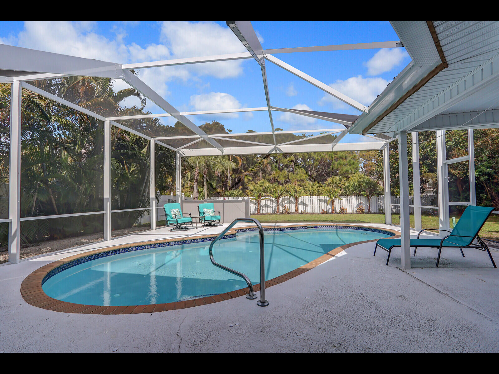 Screened in pool and covered lanai