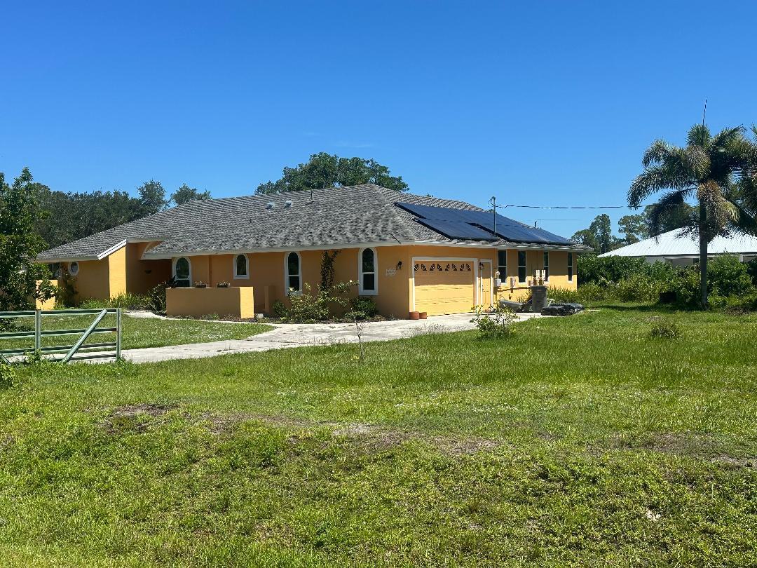 Foto de propiedad en 15185 Tangelo Boulevard, The Acreage, FL 33412 The Acreage con MLS# 