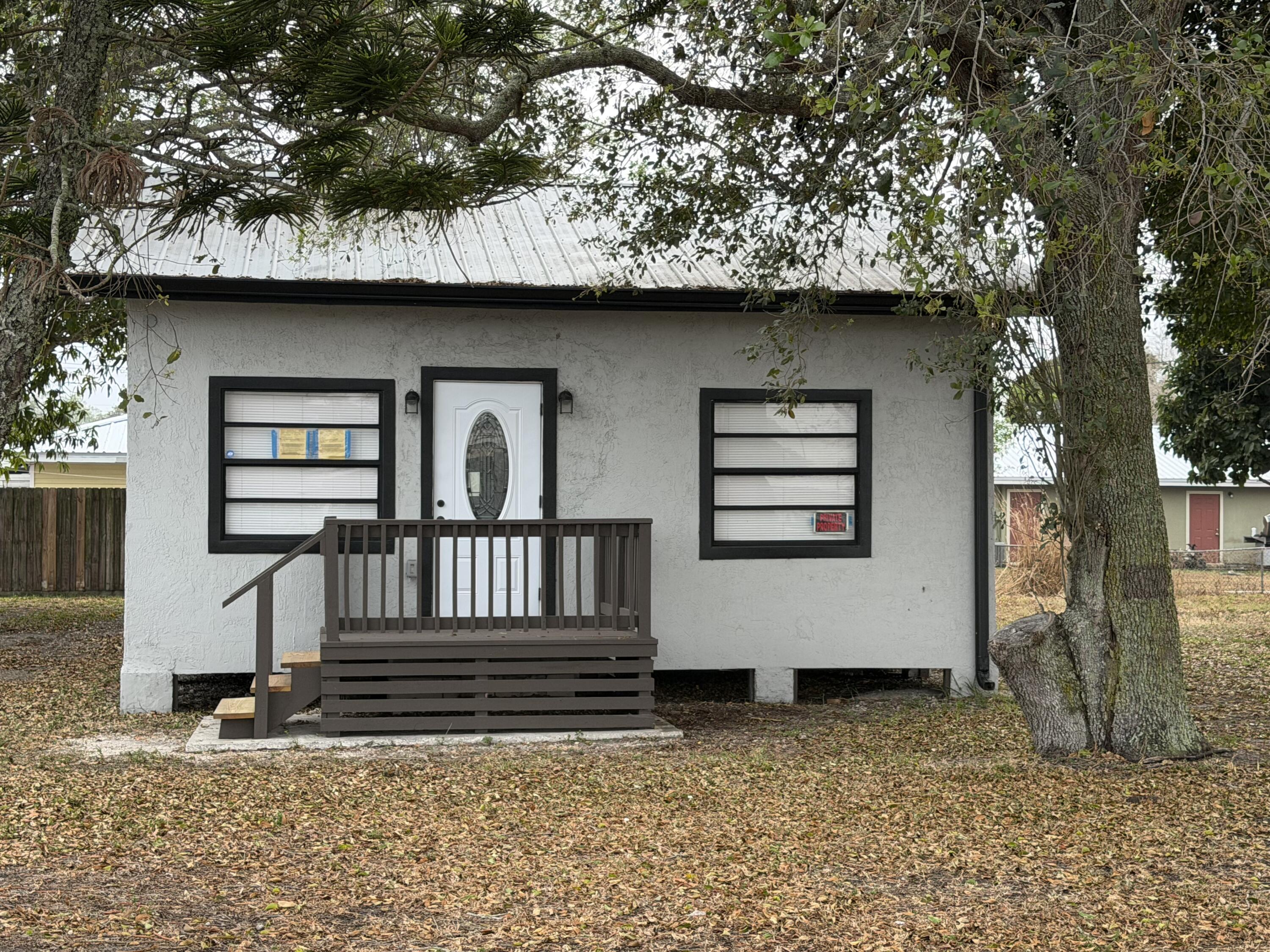 Foto de propiedad en 210 Basilan Crescent, Clewiston, FL 33440 Clewiston con MLS# 