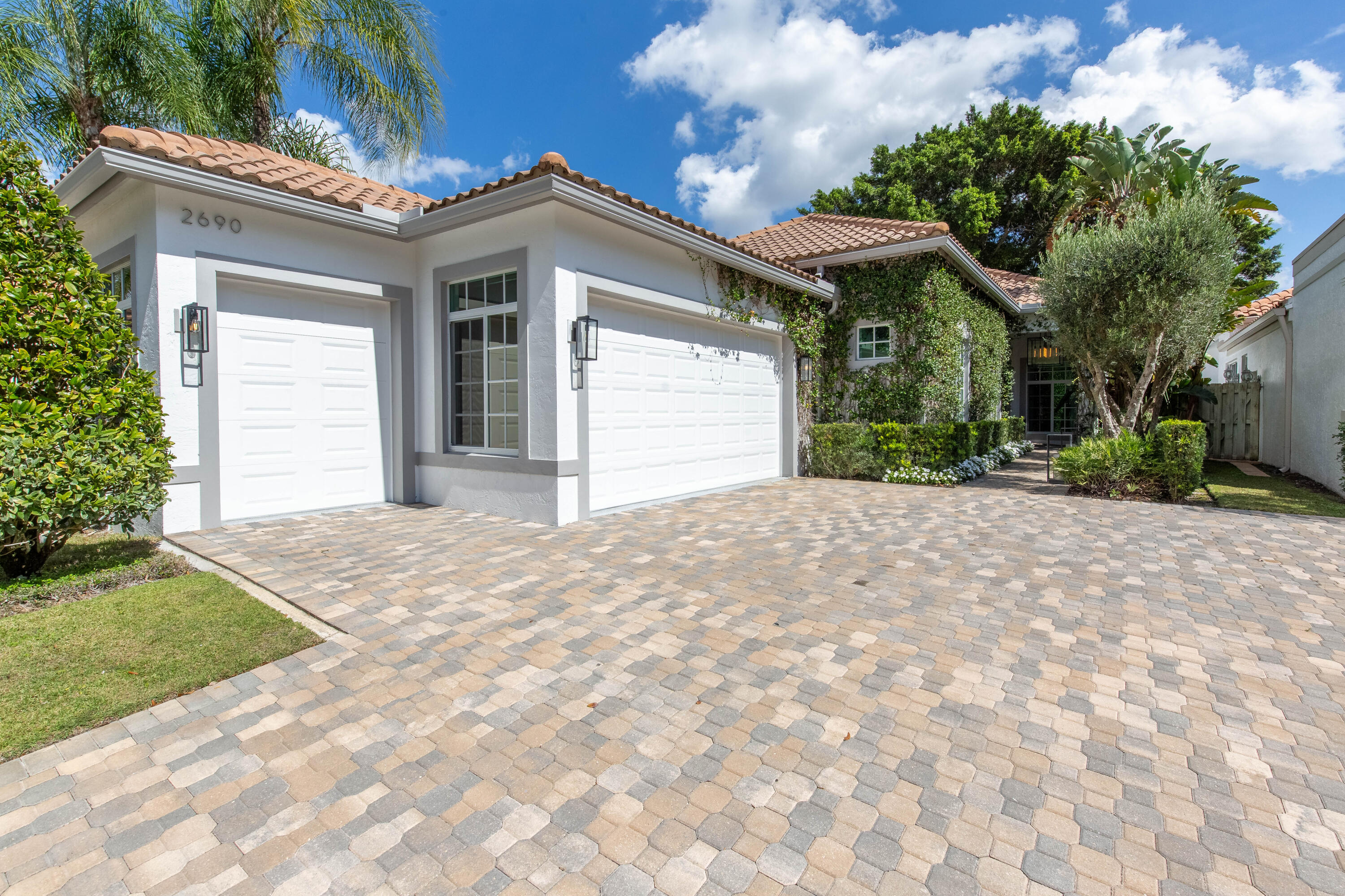 Foto de propiedad en 2690 Players Court, Wellington, FL 33414 Wellington con MLS# 
