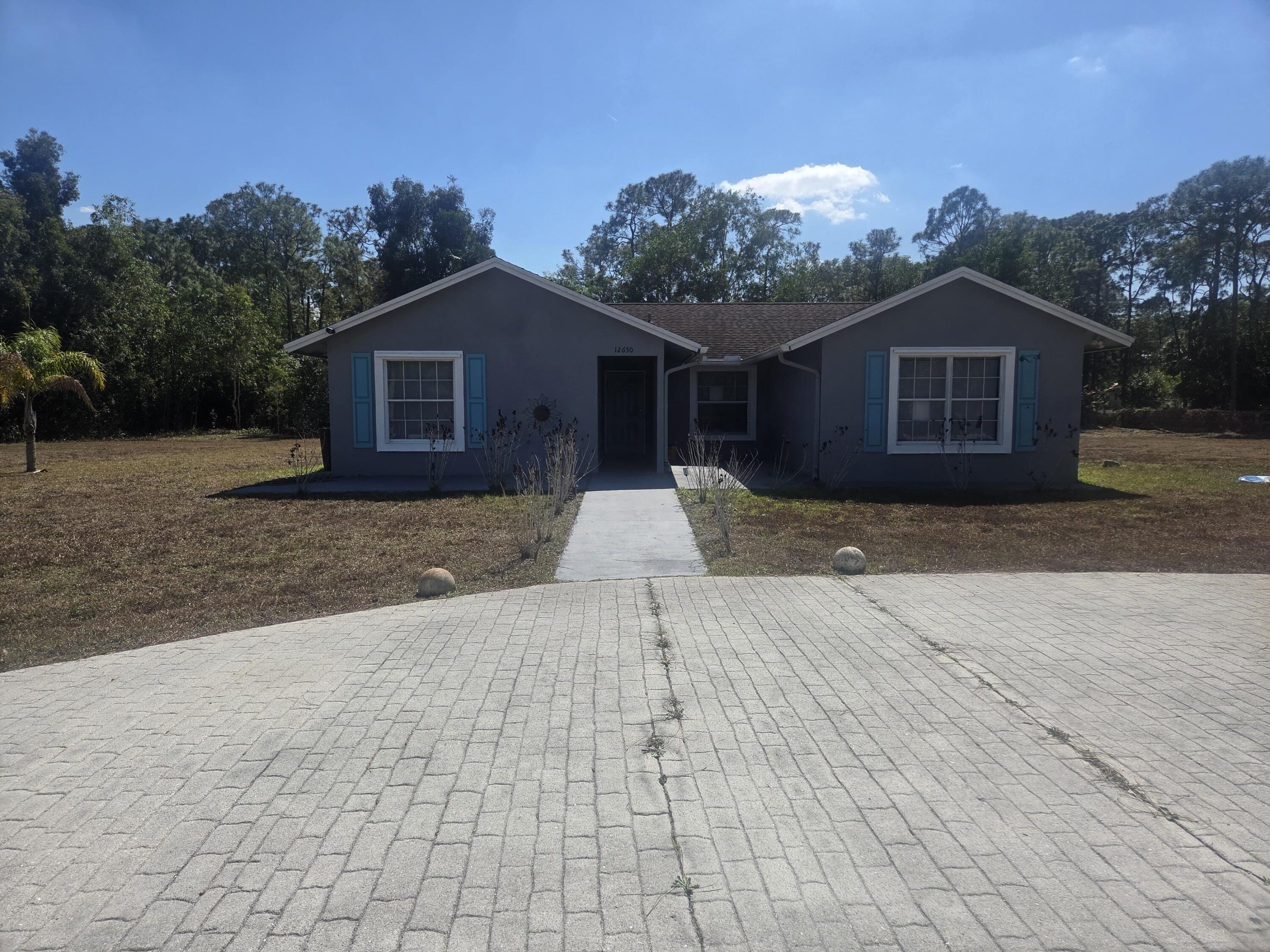 Foto de propiedad en 12650 69th Street N, West Palm Beach, FL 33412 West Palm Beach con MLS# 