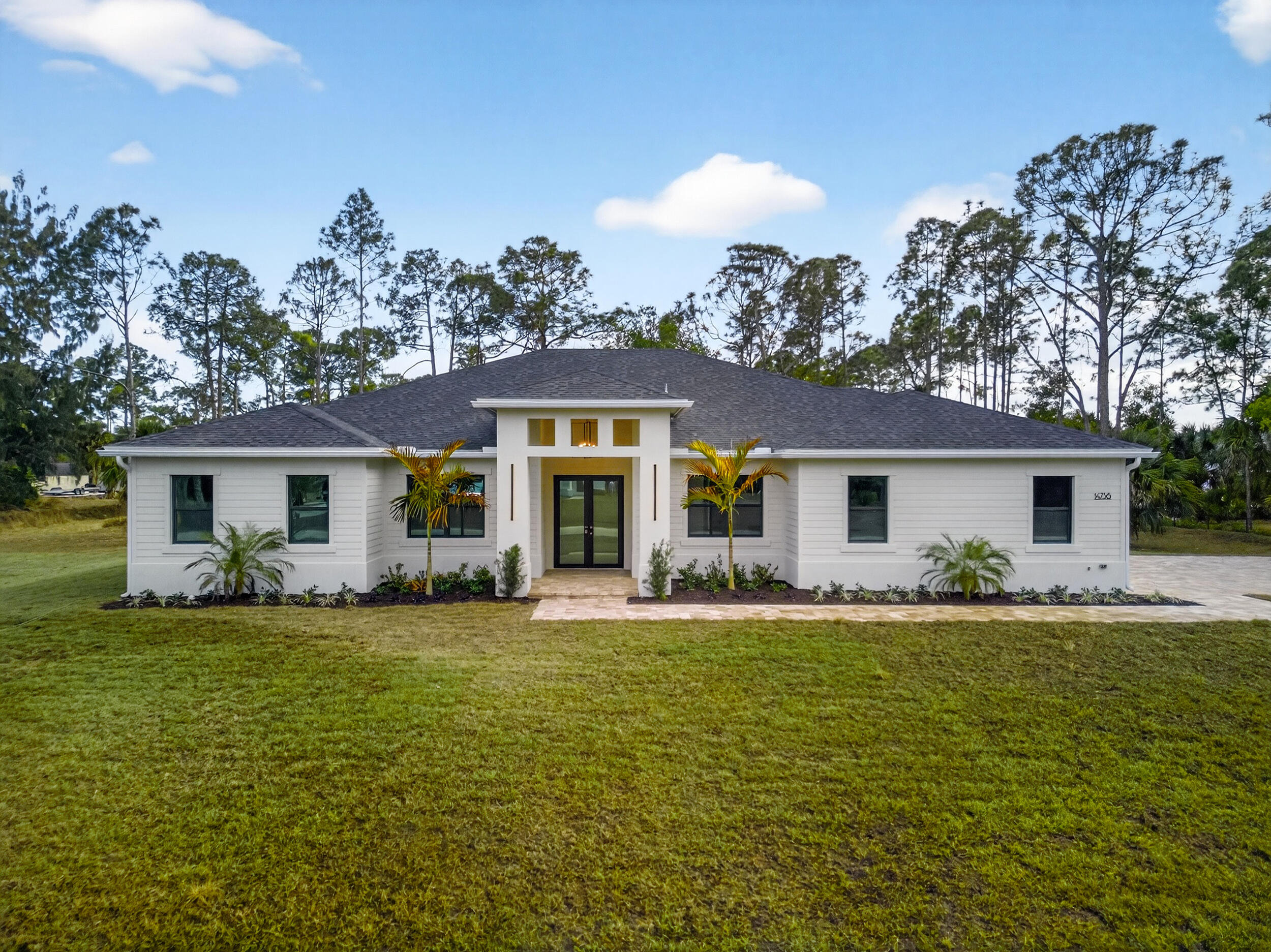 Foto de propiedad en 14736 69th Street N, Loxahatchee, FL 33470 Loxahatchee con MLS# 