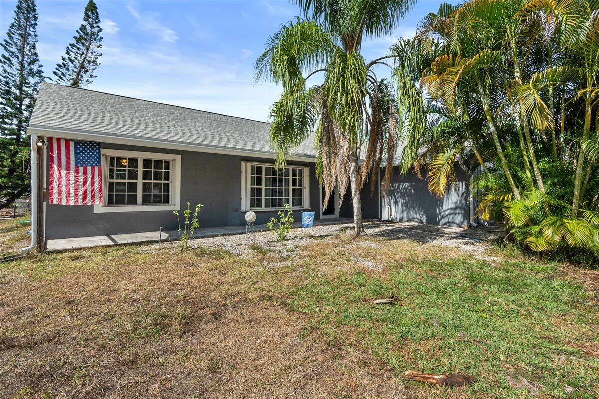 Foto de propiedad en 14537 77th Place N, Loxahatchee, FL 33470 Loxahatchee con MLS# 
