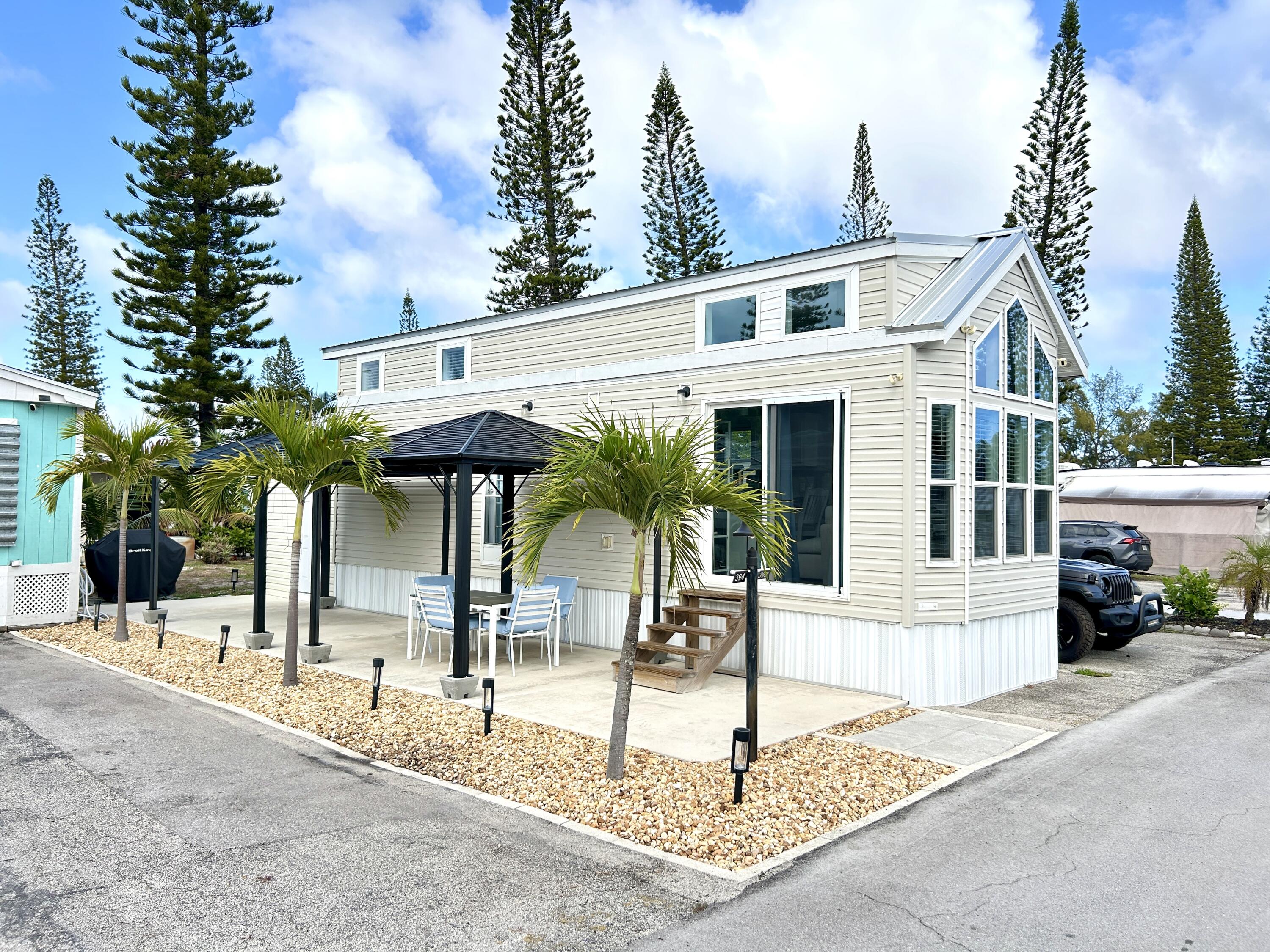 Foto de propiedad en 875 NE 48 Th Street Lot 393, Pompano Beach, FL 33064 Pompano Beach con MLS# 
