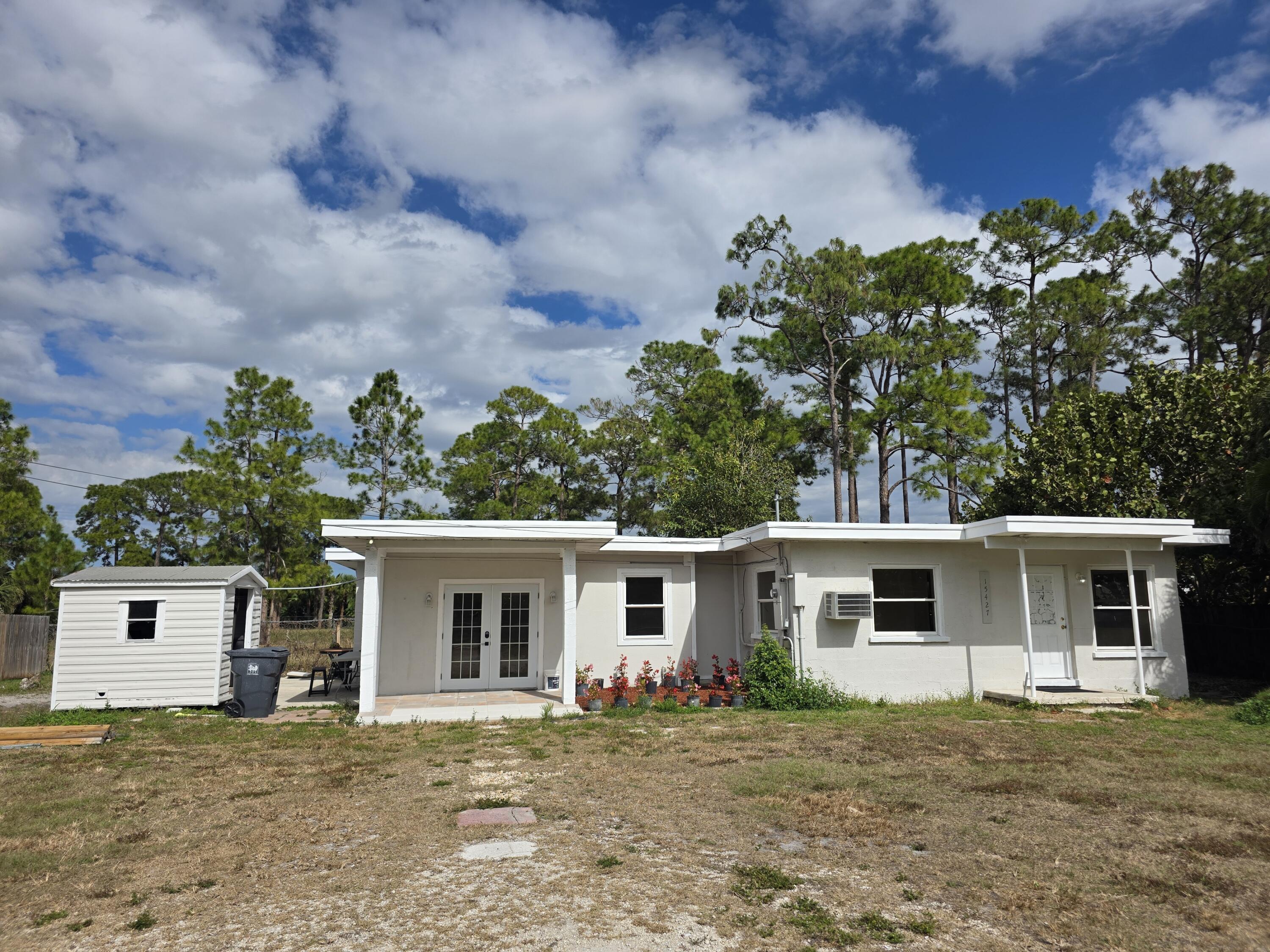Foto de propiedad en 15427 San Diego Drive, Loxahatchee Groves, FL 33470 Loxahatchee Groves con MLS# 