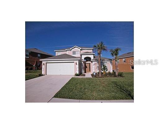 Foto de propiedad en 8515 PALM HARBOR DR KISSIMMEE con MLS# S5149105