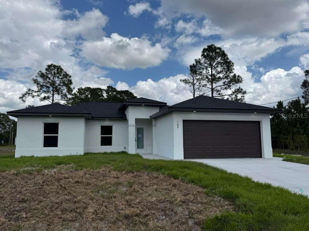 Foto de propiedad en 765 PUCCINI AVE S LEHIGH ACRES con MLS# S5149392