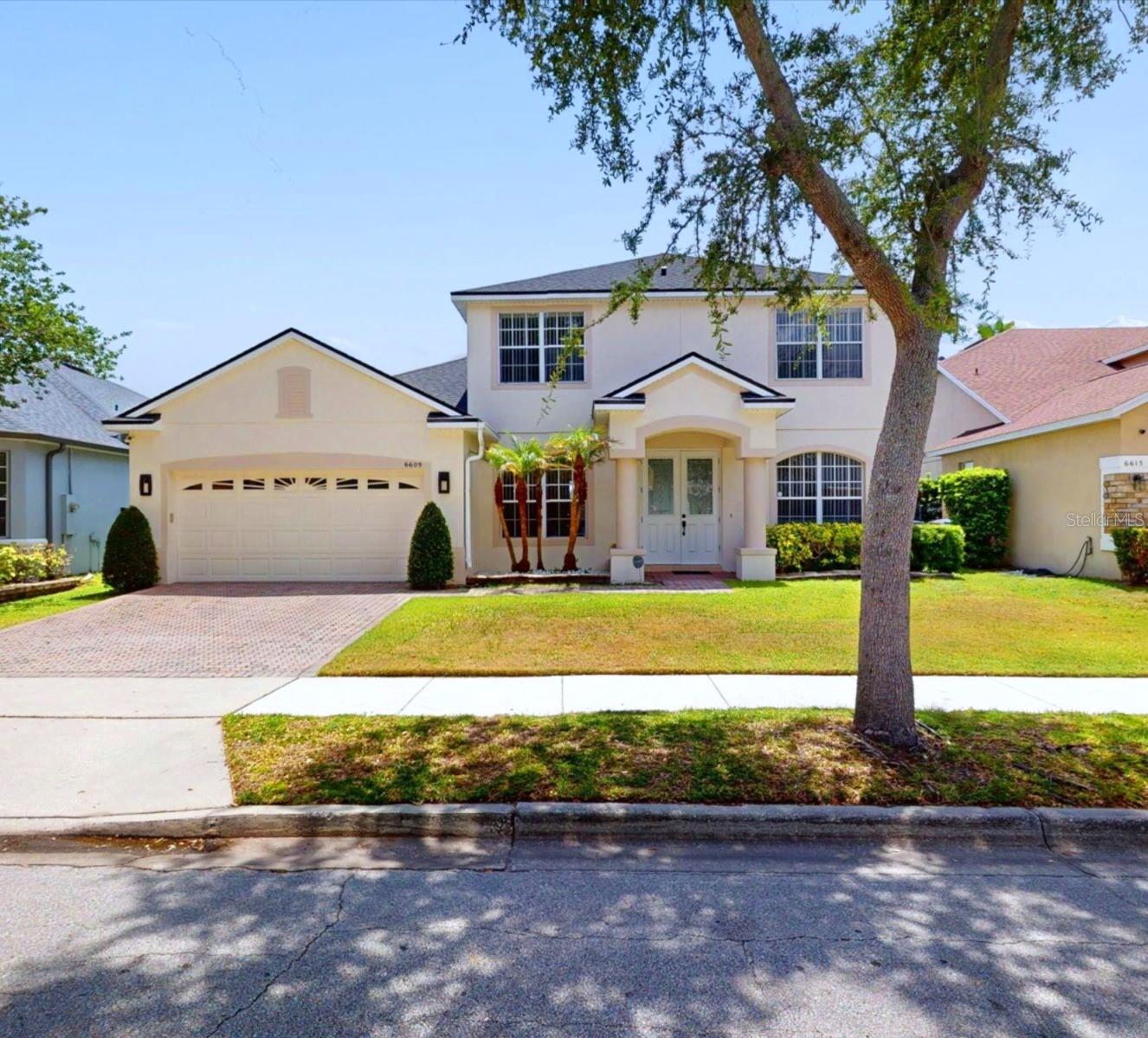 Foto de propiedad en 6609 LAKE PEMBROKE PL ORLANDO con MLS# S5151716