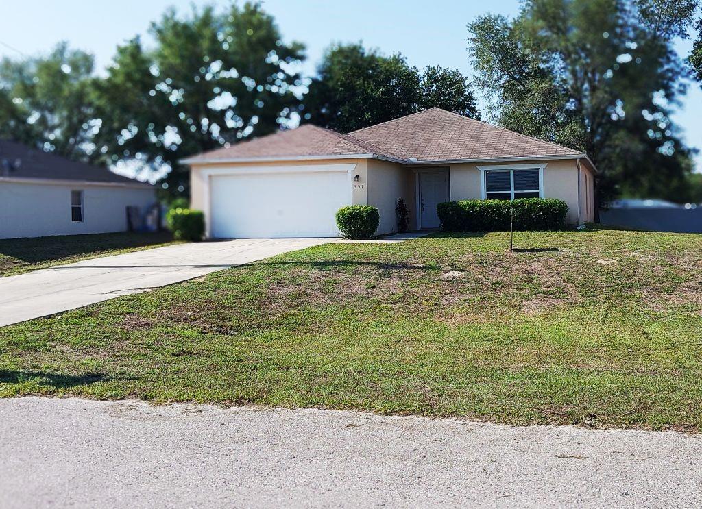 Foto de propiedad en 557 WINDERMERE DR LEHIGH ACRES con MLS# TB8382022