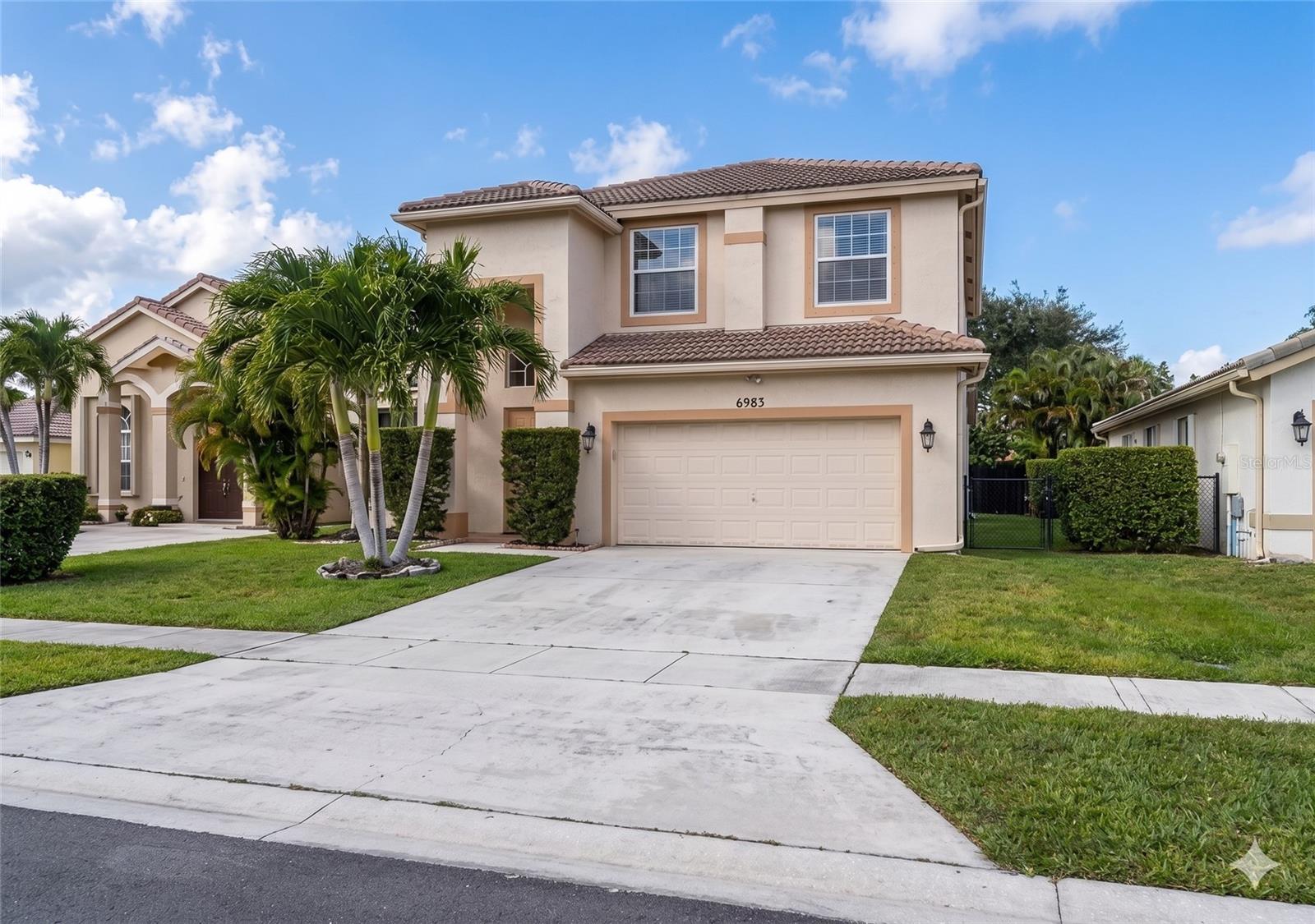 Foto de propiedad en 11483 BEACON POINTE LN WELLINGTON con MLS# TB8507257