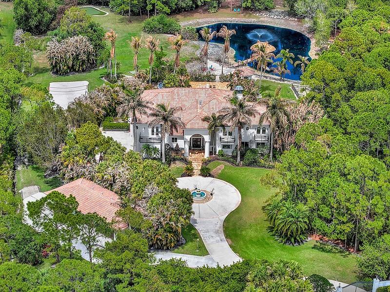Foto de propiedad en 2584 SE RANCH ACRES CIR JUPITER con MLS# TB8522877