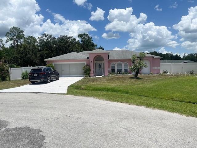 Foto de propiedad en 619 MAYAN PL KISSIMMEE con MLS# TB8535977