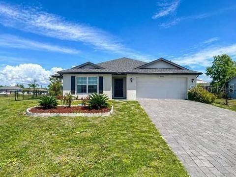 Foto de propiedad en 2123 NE 6TH AVE CAPE CORAL con MLS# TB8538677