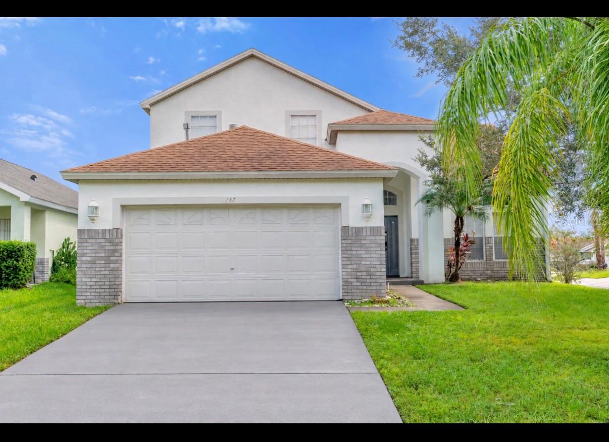 Foto de propiedad en 137 S ROMA WAY KISSIMMEE con MLS# TB8546909