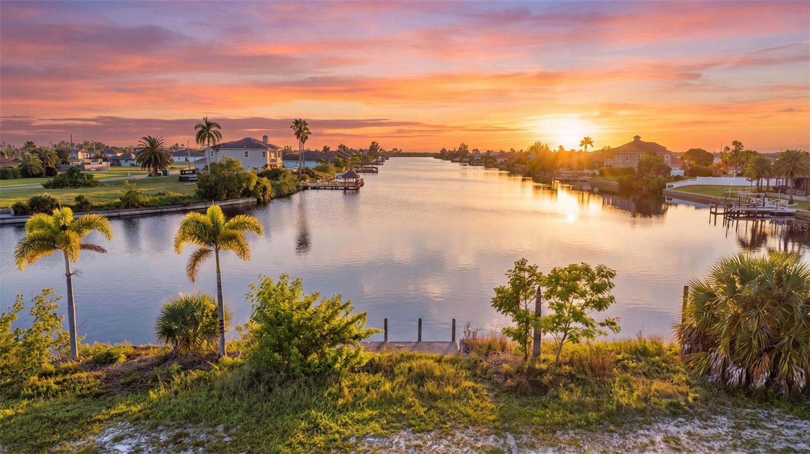 West facing backyard provides incredible sunset views over Longview Canal